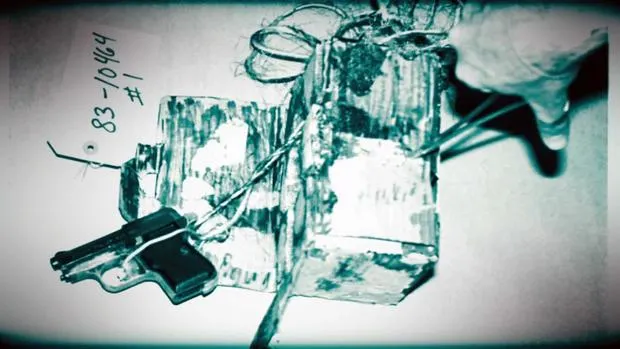 A crude homemade booby trap found in Circleville, Ohio, rigged with a gun inside a box, discovered by Mary Gillespie after removing an obscene roadside sign.